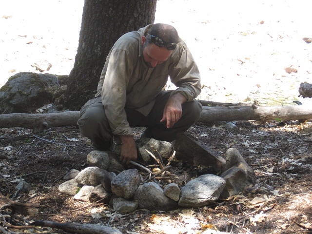 Mickey building one of our only campfires