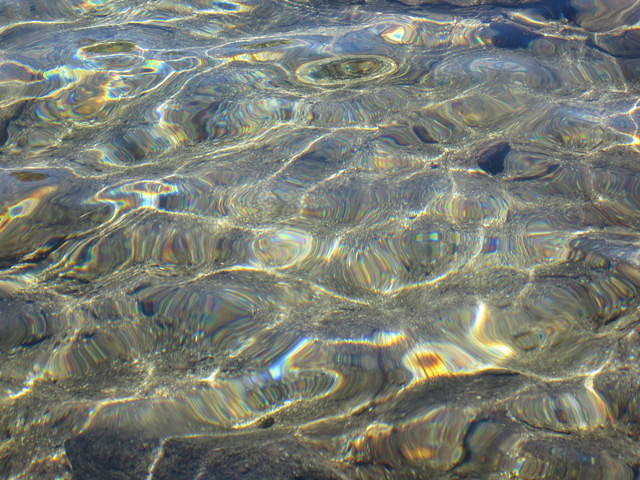 I loved watching the ripples reflect in the sun while we pumped water so I couldn't pass up taking these photos.