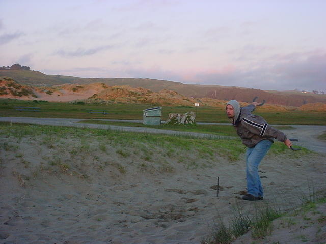 Playing horseshoes back at camp