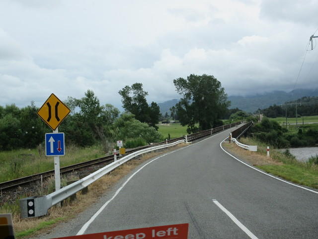 One lane bridge and that sign show that we have the right of way (but you never know if the person on the other side realizes that).