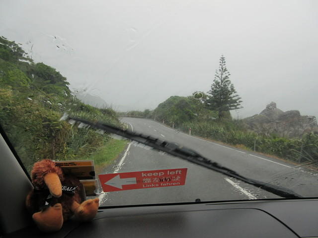 Driving along the coast in the rain.