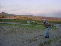 Playing horseshoes back at camp