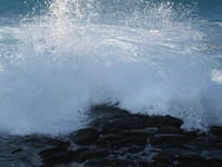 Watching the waves crash on the rocks