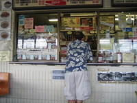 Mickey ordering at Low's (Local cuisine which was wierd yet surprisingly good)